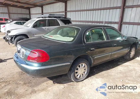 2002 Lincoln Continental from USA, damaged, VIN 1LNHM97V92Y682146